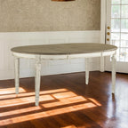Signature Design by Ashley Extendable Round to Oval Dining Table, White
